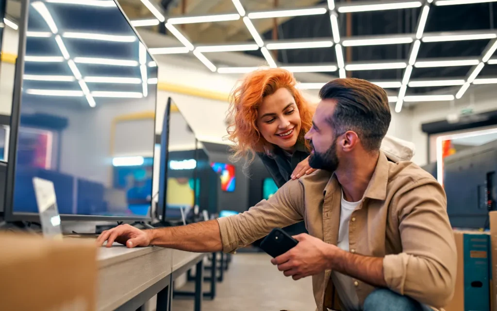 Couple shopping for a new TV